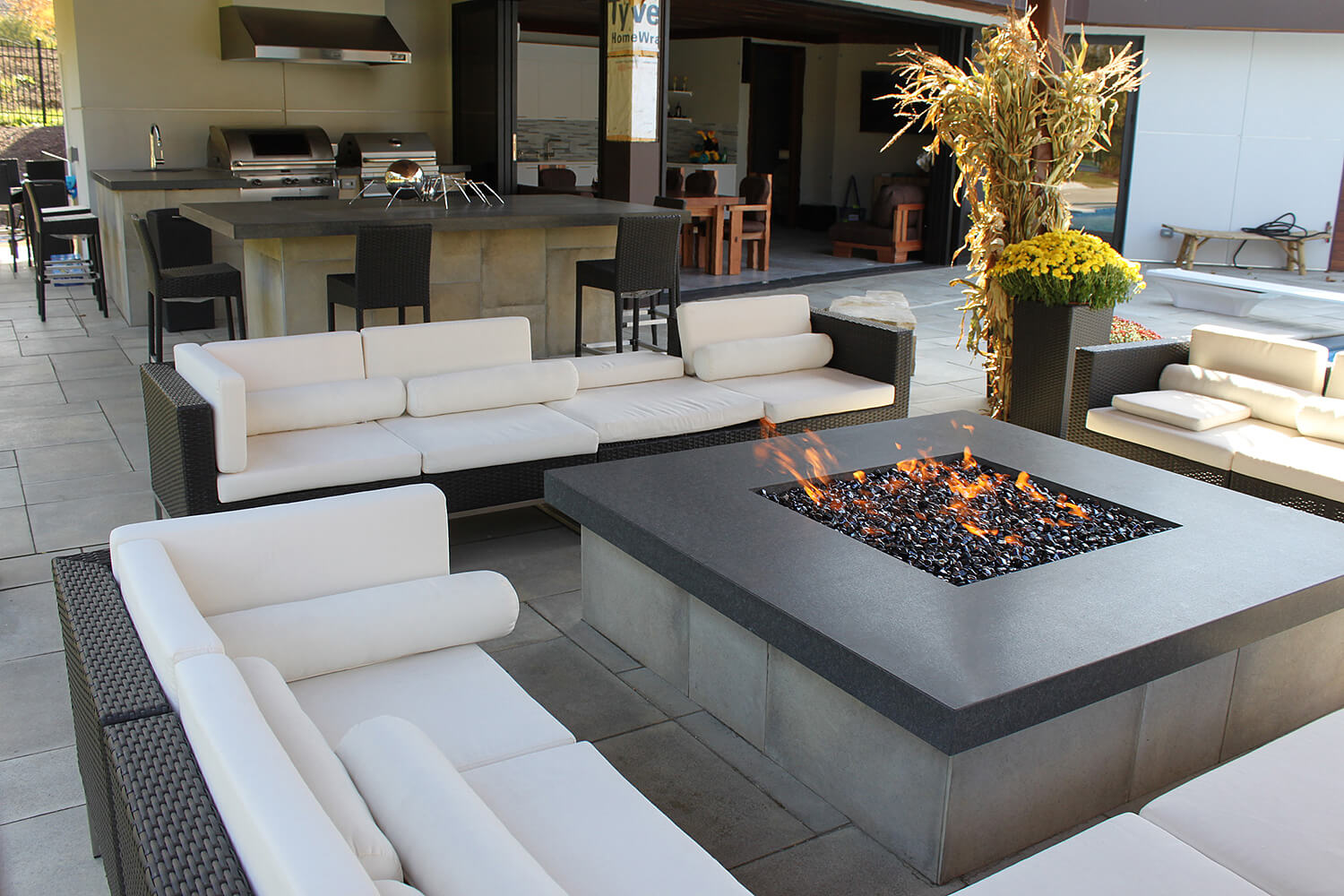 Outdoor Kitchen, Fire Table, and Landscape Design by A Touch of Green