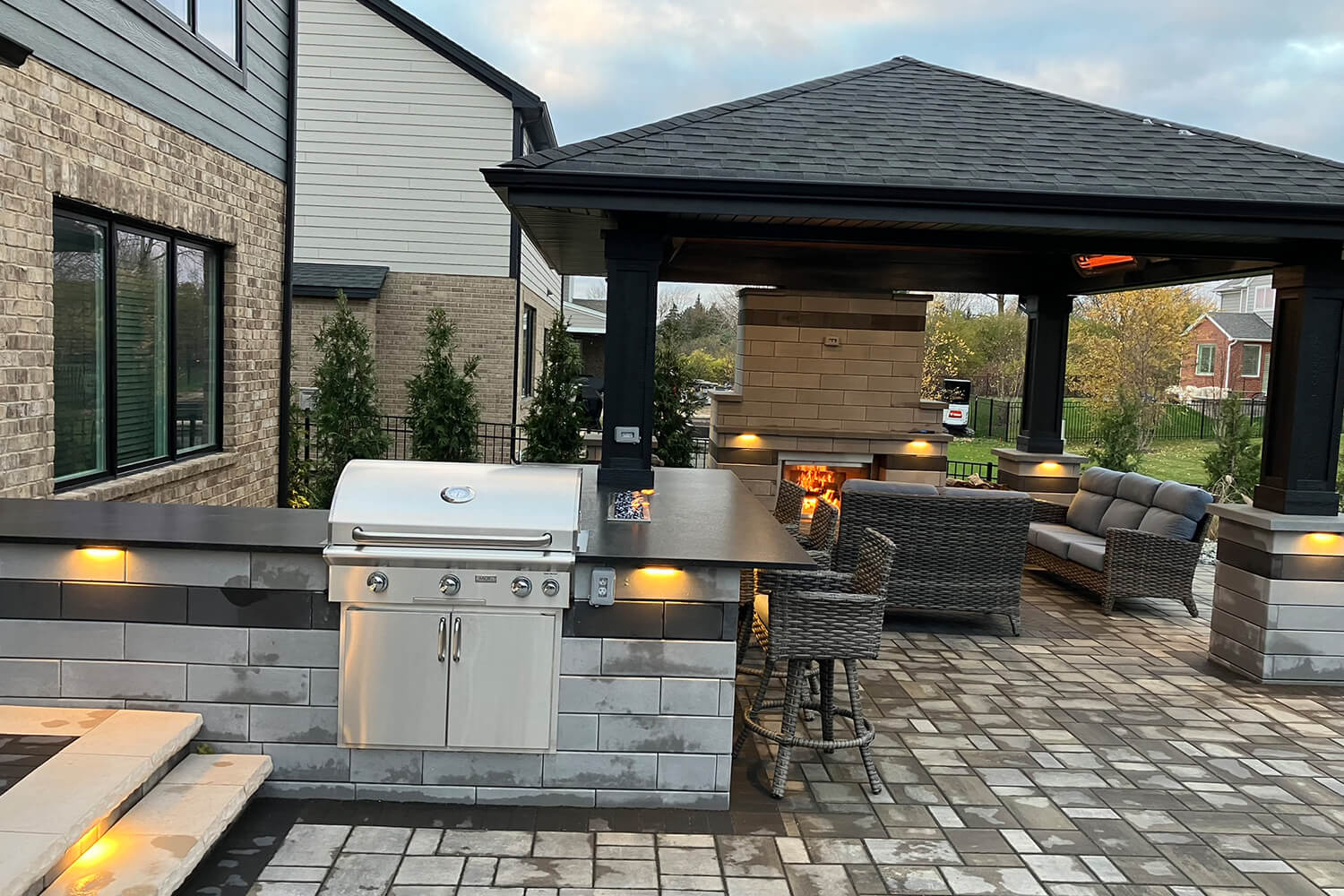 Design Transformation with Pergola, Outdoor Kitchen, and Landscape Design by A Touch of Green