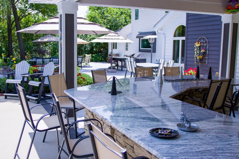 Outdoor Kitchen, Outdoor Lighting, and Landscape Design by A Touch of Green