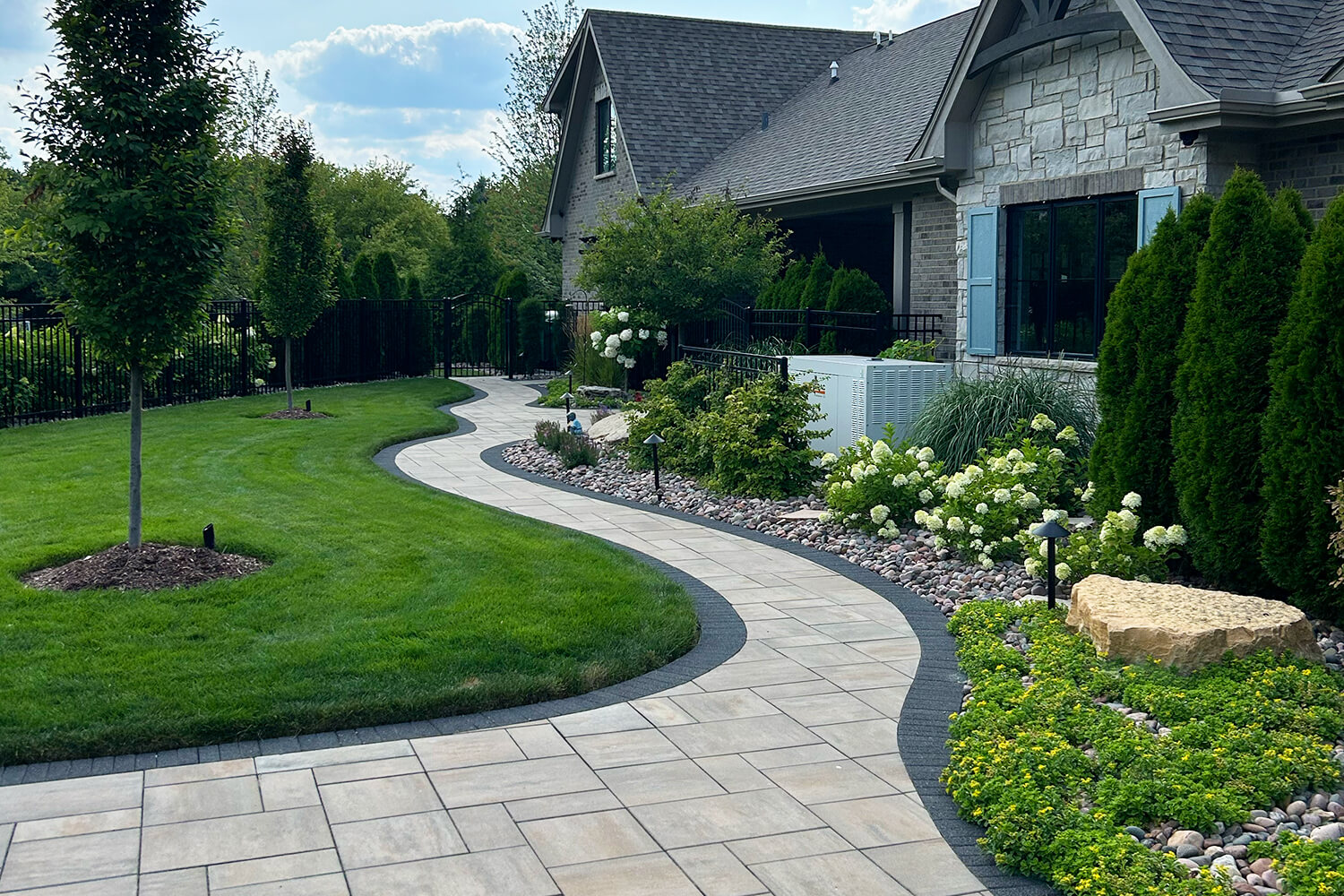 Paver Walkway and Landscape Design by A Touch of Green