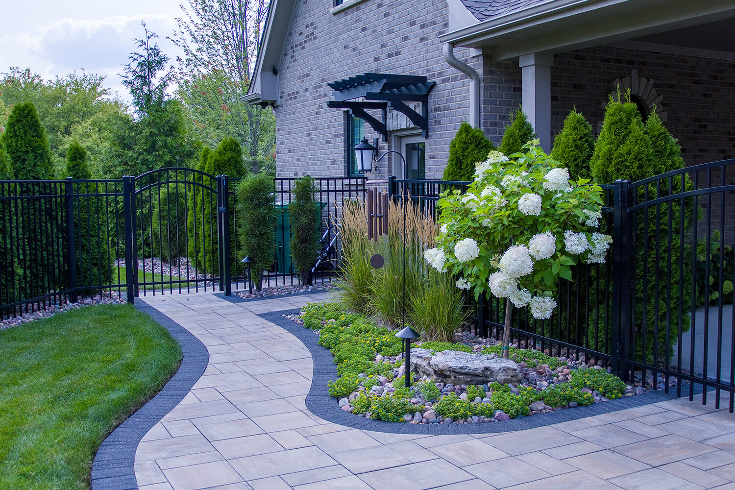 Pavers, Outdoor Lighting, and Landscape Design by A Touch of Green