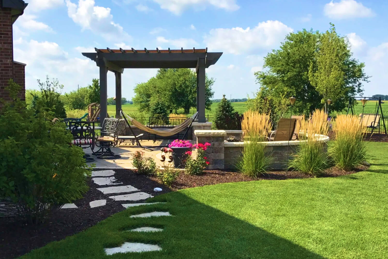 Pergola, Paver Patio, and Landscape Design by A Touch of Green